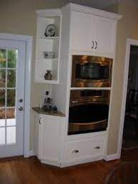 If you angle the cabinets, like in this kitchen from turan designs, the shelves automatically face you instead of each other. 13 Angled Cabinet Ideas Cabinet Kitchen Cabinets Kitchen Design
