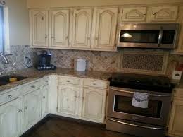 distressed white kitchen cabinet design