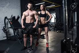 Look great & feel great www.gymfitnation.com. Fit Couple In Sportswear Posing Together At Gym Stock Photo Picture And Royalty Free Image Image 80683033
