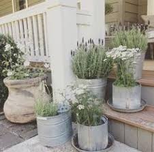 Rustic and modern design elements complement one another in this 2,480 sq. 400 Farmhouse Gardens Porches Ideas Farmhouse Garden Outdoor Gardens Farmhouse
