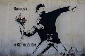 Banksy graffiti on palestine wall. Banksy In Bethlehem Banksy Street Art Bethlehem Palestine The Whole World Is A Playground