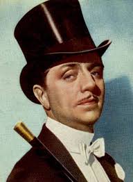 The caption is wrong: "Thorman" Powell is actually her son Norman, whose  father was her first husband George Barnes, but who was adopted by her  second husband Dick Powell when they married.