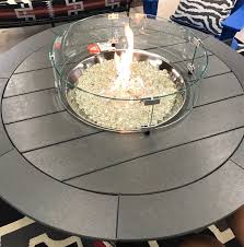 That will create enough room for a healthy fire but still keep gatherers close enough to chat. Polywood 48 Round Firepit