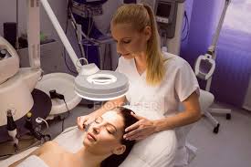 Laser hair removal can be dangerous in inexperienced hands. Female Dermatologist Performing Laser Hair Removal On Patient Face In Clinic Care Body Care Stock Photo 225285234