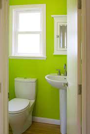 Striped towels on hooks tie in with the casual, friendly mood. 5 Fresh Clean And Spring Worthy Bathroom Colors Lime Green Bathrooms Green Bathroom Bathroom Colors