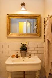 These everyday objects used in normal bathroom routines become beautiful pieces of art. John Derian S Home As Featured On The Selby White Tile Gray Grout Gold Mirror Basin That Mirror John Derian Bathroom Inspiration Framed Bathroom Mirror