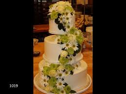 We did not find results for: 3 Tiered White Wedding Cake With White And Yellow Flowers Cascading Down The Side Floral Wedding Cakes Summer Wedding Cakes Cool Wedding Cakes