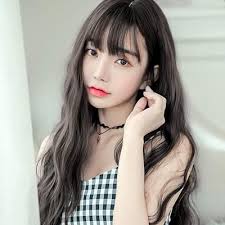 Mellemlang bølget fuld paryk med en fluffy bob Denmark