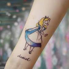 In walt disneys version of alice in wonderland the cheshire cats smile is a crescent morphing into the moon and vice versa. Small Alice In Wonderland Tattoos Popsugar Love Sex
