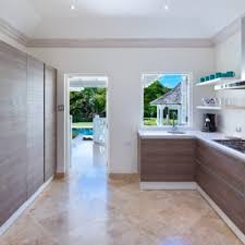 Molding improves the overall effect of the kitchen by creating a custom and polished look. Moondance Dillon Amber Dane Kitchen Cabinets Appliances Barbados