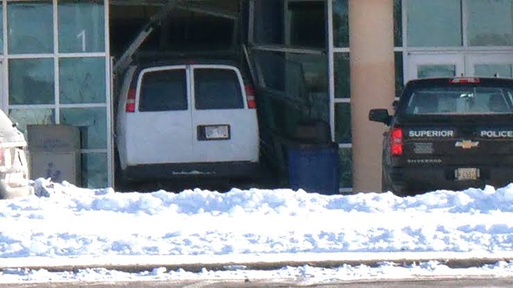 Superior Police Officer shot, suspect in custody - WDIO.com