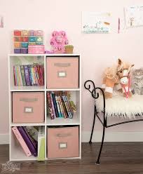 Rosa Organizer Im Kinderzimmer Bilder An Der Wand Kuscheltier Pferd Schlafzimmerorganisation Coole Betten Fur Kinder Babyzimmer Deko
