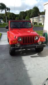 Image result for Flame Red 2003 Jeep