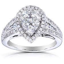 Looking For The Perfect Pear Cluster Ring Engagement Ring Primer Pear Shaped Diamond Engagement Rings Pear Shaped Diamond Ring Round Diamond Engagement Rings