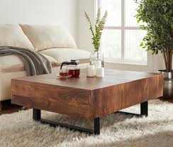 Made of solid mango wood that beautifully displays the natural grain of the wood, our anton coffee table is a modern take on rustic farmhouse style. Brookville Solid Wood Storage Coffee Table Reviews Joss Main