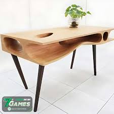 O designer Hao Ruan, do escritório LYCS, criou a CATable, uma mesa pensada para humanos e gatos. Com furos e túneis, o móvel permite que os felinos explorem e se divirtam sem