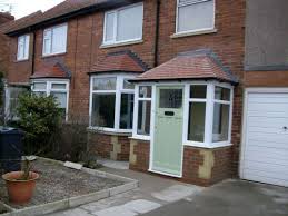 Bay and bow windows sometimes get taken for the same thing, but bow windows give a curved projection and bay windows are angular. David Troy Builder In Whitley Bay Uk Porch Extension House With Porch Porch Doors Uk
