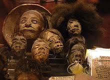 The guy had his head shrunken with some type of voodoo dust. Shrunken Head Wikipedia
