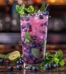 Blueberry Coconut Cooler Recipe 🥥 "Chill out with a refreshing Blueberry  Coconut Cooler!" 🥥 Ingredients: 1 cup fresh blueberries 1/2 cup coconut  milk 1 oz coconut rum 1 oz vodka 1 tbsp