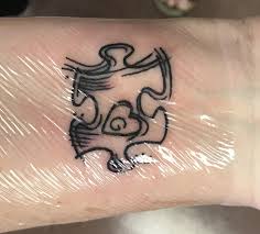 The puzzle piece logo was created in 1963 by gerald gasson, who was on the board of national autistic society in london.it was formally helen alison from the national autistic society explained this by saying,the puzzle piece is so effective because it tells us something about autism: 50 Autism Tattoos To Show Support This World Autism Awareness Day Tats N Rings