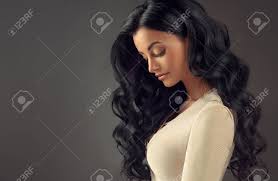 As you can see, there are so many beautiful short hairstyles for black women, so you may not worry about cutting your hair. Young Black Haired Woman With Voluminous Shiny And Wavy Hair Stock Photo Picture And Royalty Free Image Image 93601603