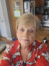 Me,today,and my self portrait of the blues after my husband passed away