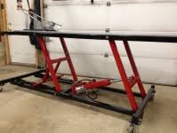 First i built a 2x4 frame and covered it with plywood Homemade Motorcycle Lifts Stands And Dollies Homemadetools Net