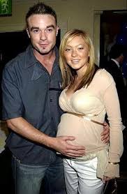 Former boyfriend and girlfriend: Fran Cosgrave with pregnant Natasha Hamilton- flaunting her baby bump