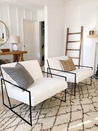 This boxy accent chair from flash furniture features classic modernist design with encasing metal frame and cubic cushion shape and comes in white or black leather to suit your needs. Home Tour A Rustic Modern Living Room Makeover Modern Rustic Living Room Living Room Designs Home Living Room