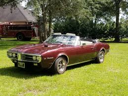 Image result for Burgundy 1967 Firebird