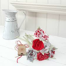 Holly branches and bright poinsettias, the quintessential red christmas flower, will make your home glow. Christmas Nordic Fabric Flowers With Engraved Tag By Little Foundry Notonthehighstreet Com