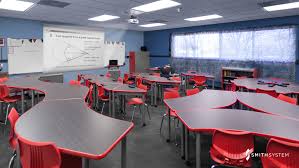 Classroom With Uxl Crescent Desks Flavors Seating Interchange Wing Desks Interchange Diamond Desks And C Modern Classroom Classroom Interior School Interior