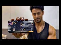 Plzz give me an account with facebook. Tiger Shroff Playing Free Fire Tiger Shroff Free Fire Gameplay Free Fire Youtube Fire Image Tiger Shroff Photo Logo Design