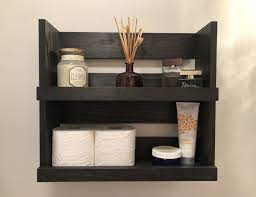 Great bathroom wall cabinet choices ward log homes. Modern Bathroom Shelf Bathroom Storage Modern Wood Shelves Wall Bathroom Shelf Bathro Bathroom Organization Decor Hanging Bathroom Shelves Bathroom Shelves