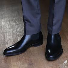 Wearing boots with a suit is a tactical endeavour that's really about one minor detail: Black Chelsea Boots With Grey Suit Trousers Boots Outfit Men Chelsea Boots Outfit Black Chelsea Boots