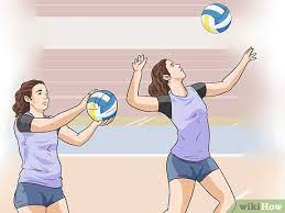 You should have 2 rows of players, with the first row closest to the net and the back row closest to the rear boundary of the court. Volleyball Spielen Wikihow