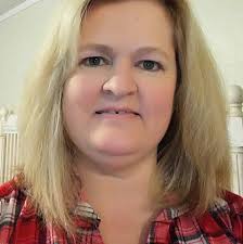 What public beach in Destin has 100% clear waters?