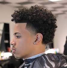 Add further boldness to the style by dying your hair grey. Pin On Taper Fade Curly Hair