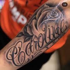 This article compiles 90 name tattoos utilizing various fonts and placements that freshen up the tradition a cursive font is used to spell out the name egan on the wearer's right wrist in this tattoo. Cursive Lupita Name Tattoo Novocom Top