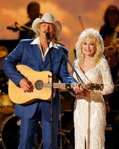 Go shake up heaven." Alan Jackson's tear-jerking goodbye to Dolly Parton. The world is weeping for the Queen of Country Music today. Dolly Parton went from a dirt-poor childhood in the Smoky