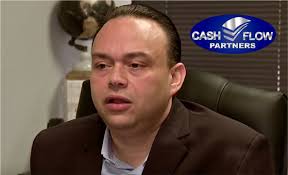Encadenado en la corte el principal ejecutivo dominicano de Cash Flow es  acusado de varios cargos por estafa de cuatro millones