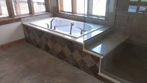 Black and white bathroom tile. Divine Design Kitchen Bath Llc Home