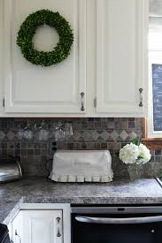 We'd have been better off lining with shelf liner. Painted Kitchen Cabinets Three Years Later