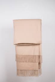 This blanket is baby bum soft and is a sustainable take on a classic piece. Camel Wool Throw Shawl Nordic Swan Living