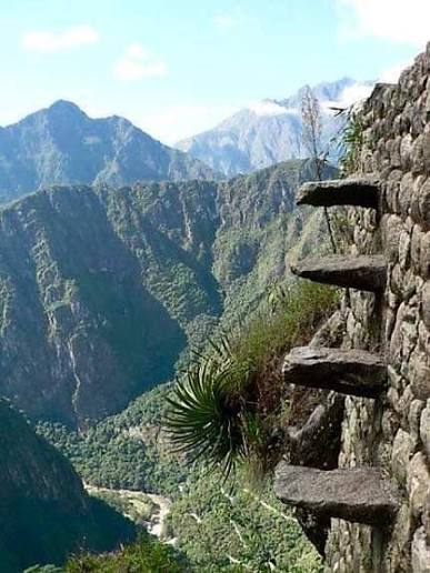 Inca floating steps on Huayna Picchu mountain in Peru