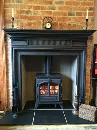 Living Room Carron Belgrave Cast Iron Surround Stovax Riva Plus Midi Woodburning Stove Black Slate Hearth Fireplace Surrounds Fireplace Cast Iron Fireplace