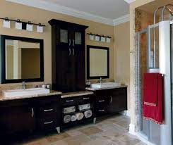 Explore your options for unfinished bathroom vanities and cabinets, and prepare to install an efficient storage template in your bath space. Espresso Shaker Cabinets In Contemporary Bathroom Kitchen Craft Country Bathroom Vanities Kitchen Craft Cabinets Kitchen And Bath Remodeling