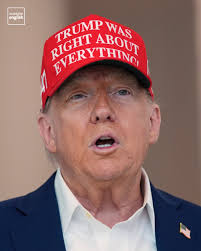 US President Donald Trump wears a “Trump Was Right About Everything!” hat,  as he visits The People's House: A White House Experience Museum, in  Washington. #Trump