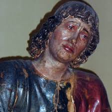 A life-size, terracotta (a type of earthenware) sculpture group shows seven  biblical figures gathered around the dead body of Jesus Christ. Created in  the 1480s for Duke Ercole d'Este of Ferrara, Guido