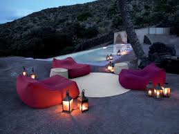 Japanese Outdoor Lanterns Tropical Pool And Bean Bag Chairs Candles Hillside Infinity Pool Lanterns Lap Pool Lounge Seating Modern Furniture Outdoor Cushions Outdoor Lighting Outdoor Rug Palm Trees Patio Furniture Pool Pool